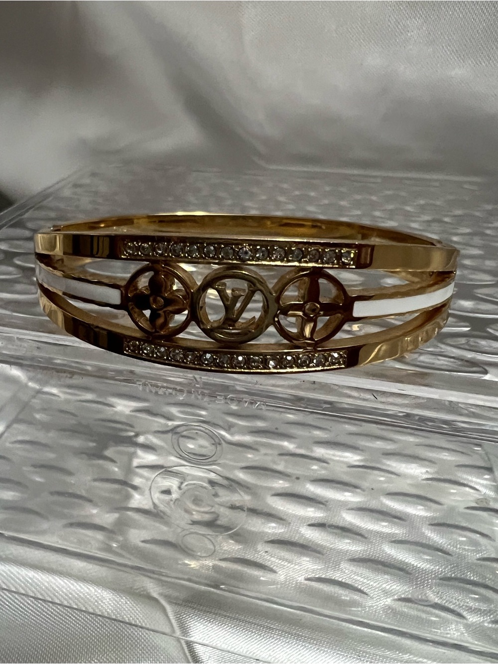 Gold and White Logo Crystal Triple-Row Bangle